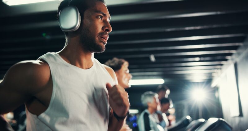 Exercise, man and running on treadmill with headphones at night for agility training, speed challenge and fitness music. Cardio, evening workout or playlist for calorie burning and performance at gym. SSUCv3H4sIAAAAAAAAA21S0W7bMAz8Fz3nwZZrL8mvDENBS3QsVBINie5mBPn3UVKAdmvf7giSdzzprmbIzqjrXTnv98wJ2FFU1+6kEkaLqcL3NExdRWgdU3LgK5uBzRohoLqqvBLx63nU/TCokwInHY+Tygy8Z8wiIcwA403mK//QlrJskKm8zwVIZ/dt/VFseYS68KfSGuzl5dLrs/RM+mLHflpsIbo346KxN52QZbxoM+gFFiFozt3Y2emHVb9O6u03YwpPd7BbRw1uyRkXb40QryWIeoBkRKF4y+vOMivUvBXekonEyMcmgfTiejHiNO5hLuOqH6bxRXe6nlEaczvOSijPM2tYq5Ol6WiCdb+zT4f75gksF5MKLM34lC9i//iRgk0IIbMLzQx4CEdFeCCGigJl3lZiypUecARnElWyUbRjRYY87WmmP60OscQR5F5oOrhRdp/3zO5WbdRSW+HdZhF8yaHqll8mDxkwcpsxEP+byV9LvR7SIujx+AvsgxfouQIAAA==